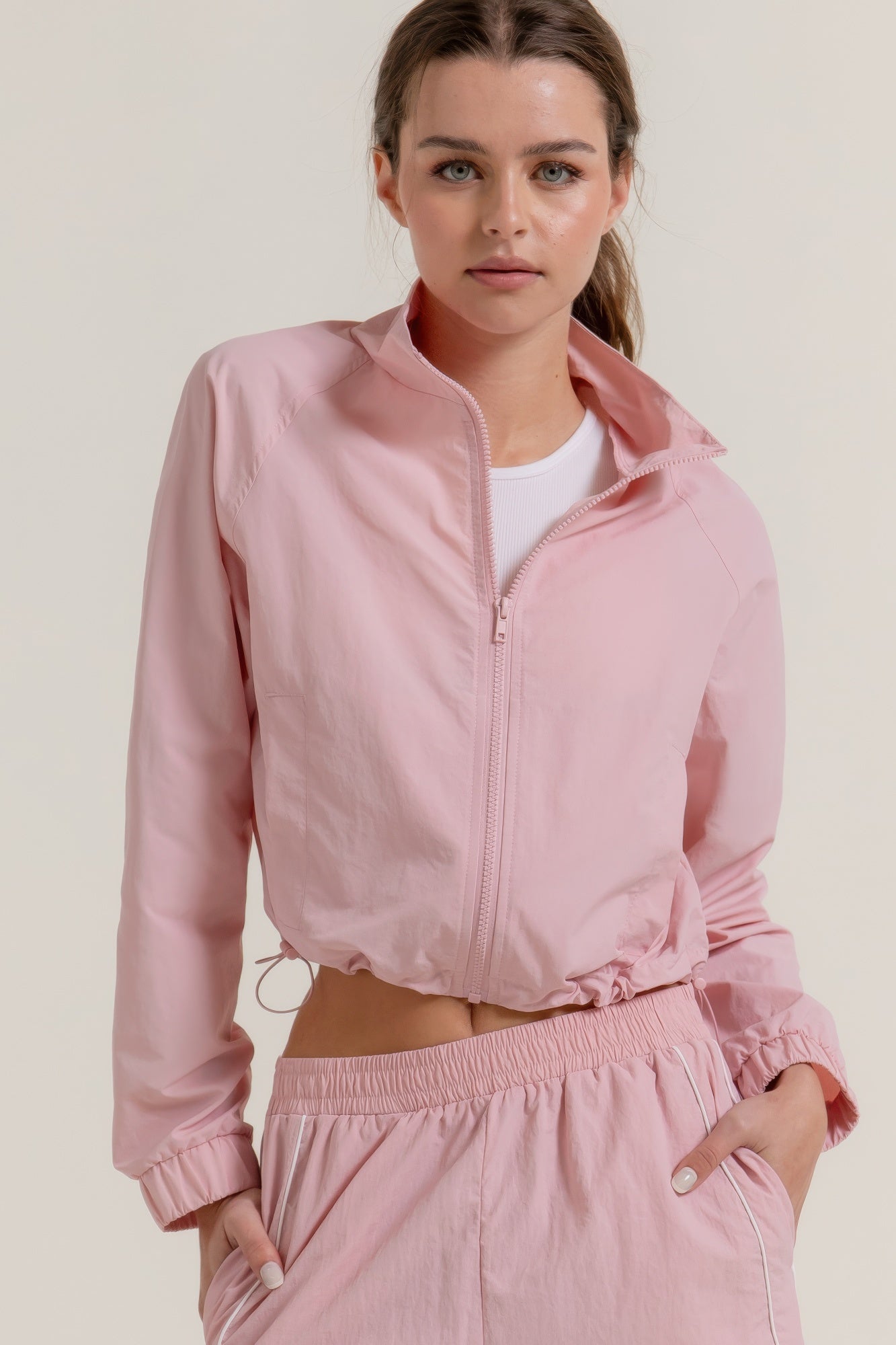 Women's crop long sleeve anorak jacket with zip front, stand-up collar, drawstring hem, and athletic fit - SplendorAmoris