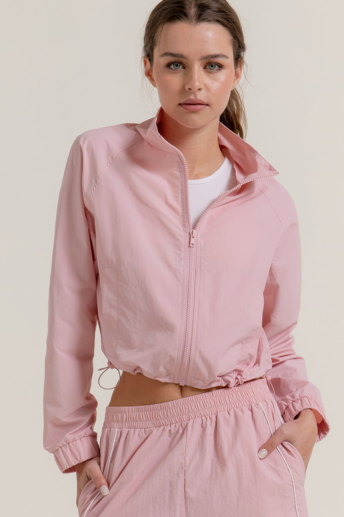 Women&#39;s crop long sleeve anorak jacket with zip front, stand-up collar, drawstring hem, and athletic fit - SplendorAmoris