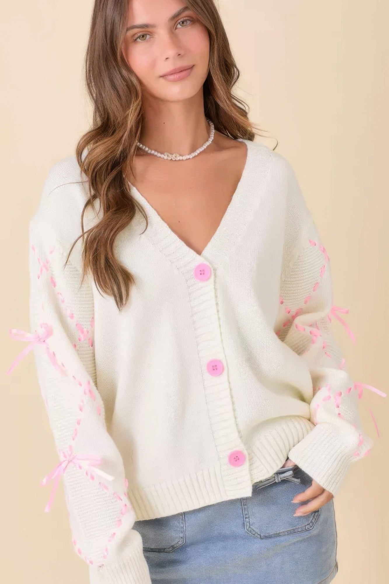 Women's ribbon sleeve V-neck cardigan with button front, long sleeves, bow details, and relaxed knit silhouette - SplendorAmoris